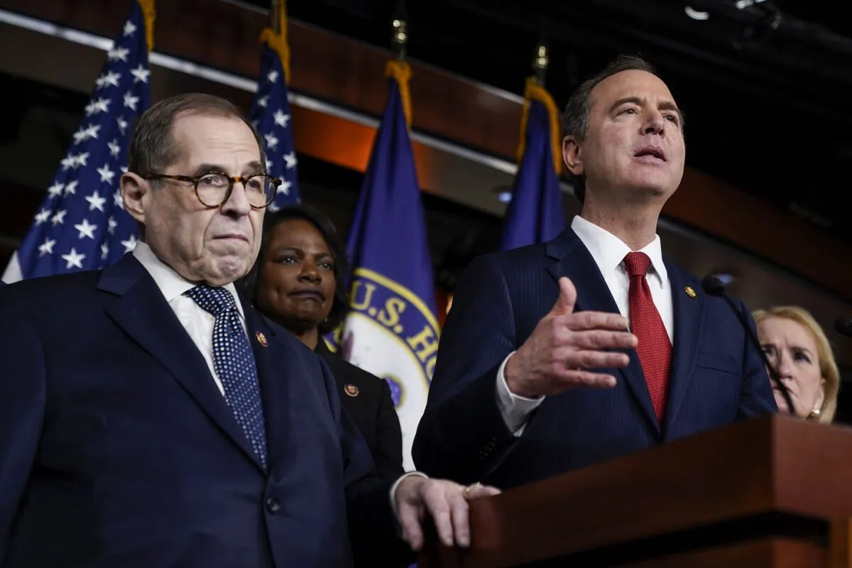(L–R) House impeachment managers Rep. Jerry Nadler (D-N.Y.) and Rep. Val Demmings (D-Fla.) look on as Rep. Adam Schiff (D-Calif.) speaks during a press conference in Washington on Jan. 28, 2020. (Drew Angerer/Getty Images)