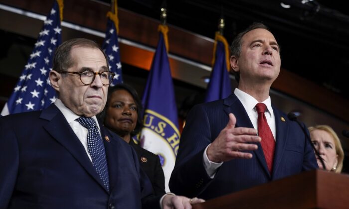 (L–R) House impeachment managers Rep. Jerry Nadler (D-N.Y.) and Rep. Val Demmings (D-Fla.) look on as Rep. Adam Schiff (D-Calif.) speaks during a press conference in Washington on Jan. 28, 2020. (Drew Angerer/Getty Images)