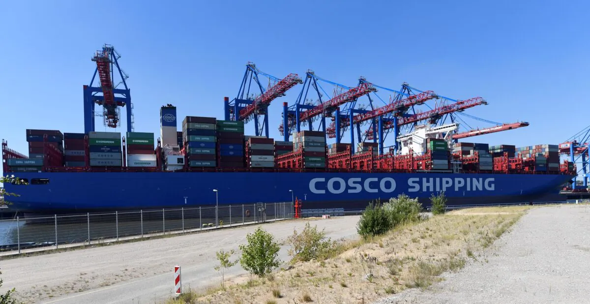 Chinese container ship "Cosco Shipping Aries" is unloaded at a loading terminal in the port of Hamburg Germany on July 27, 2018. (Fabian Bimmer/Reuters)