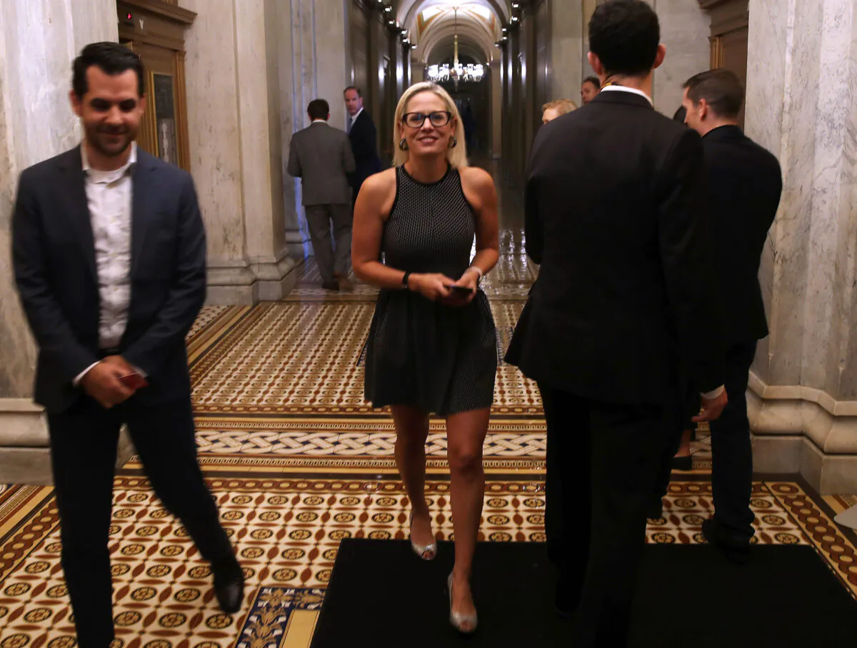 Sen. Kyrsten Sinema (D-Ariz.) walks in the U.S. Capitol in Washington on Aug. 1, 2019. (Mark Wilson/Getty Images)