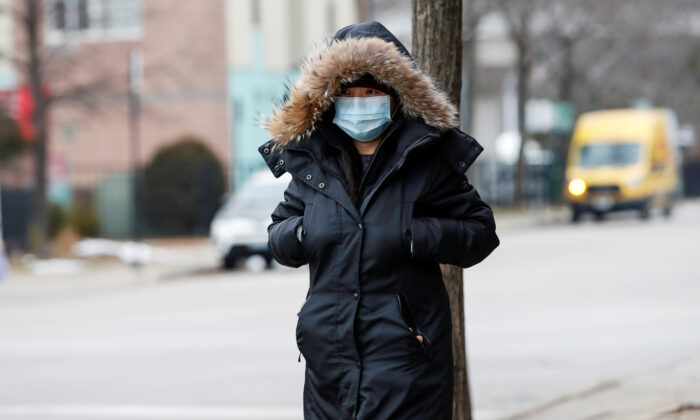 A woman wears a mask in Chinatown following the outbreak of the novel coronavirus, in Chicago, Illinois, U.S. Jan. 30, 2020. (Reuters/Kamil Krzaczynski/File Photo)