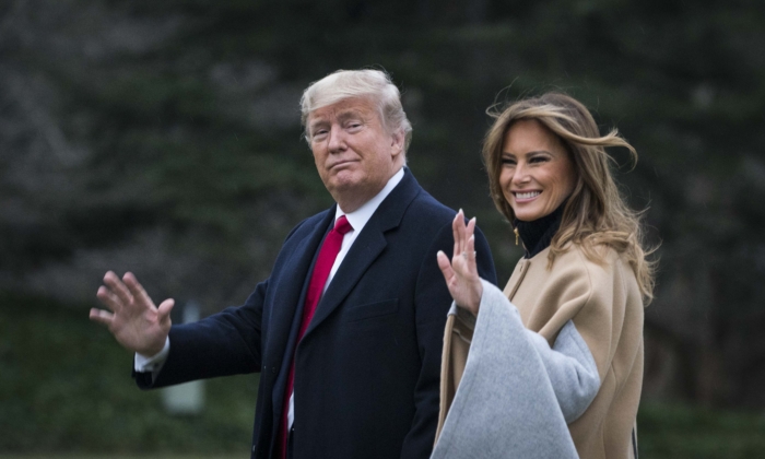 President Donald Trump and First Lady Melania Trump walk along the South Lawn to Marine One as they depart from the White House for a weekend trip to Mar-a-Lago, in Washington, on Jan. 31, 2020. (Sarah Silbiger/Getty Images)