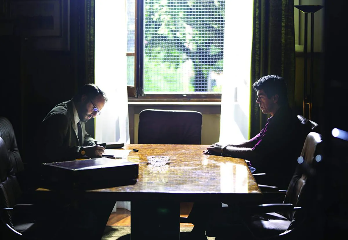 Anti-mafia judge Giovanni Falcone (Fausto Russo Alesi) listens to evidence provided by Tommaso Buscetta (Pierfrancesco Favino) who is turning against the Mafia. (Sony Pictures Classics)