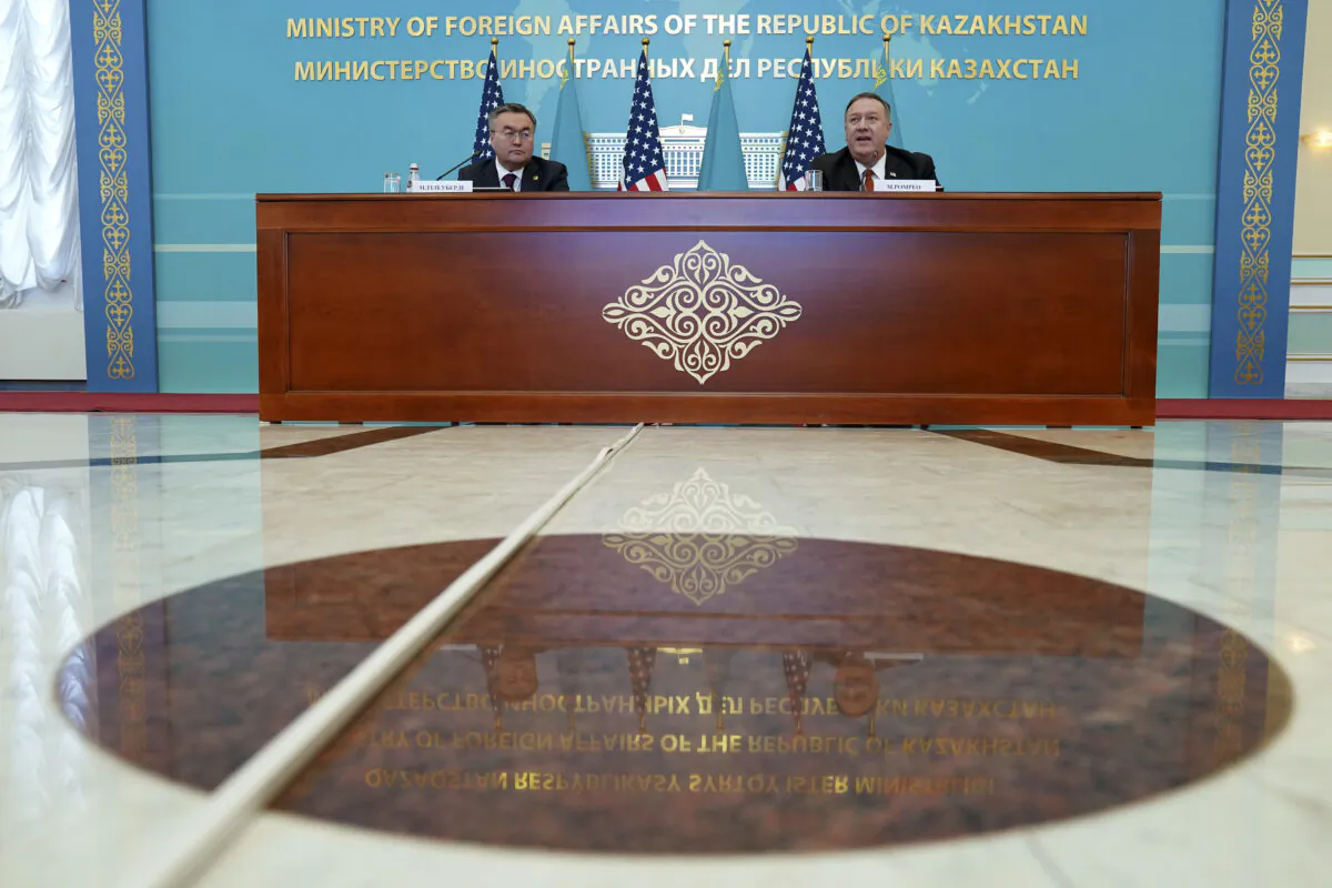 U.S. Secretary of State Mike Pompeo, right, holds a joint news conference with Kazakh Foreign Minister Mukhtar Tleuberdi at the Ministry of Foreign Affairs in Nur-Sultan, Kazakhstan, on Feb. 2, 2020. (Kevin Lamarque/Pool Photo via AP)