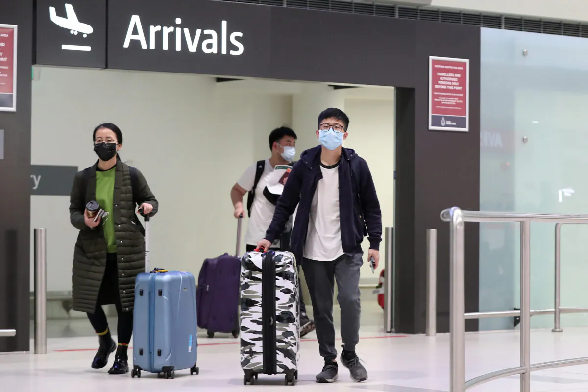 Passengers from China Southern Airlines flight CZ319 arrive at Perth International Airport in Perth, Australia, on Feb. 2, 2020. (Paul Kane/Getty Images)