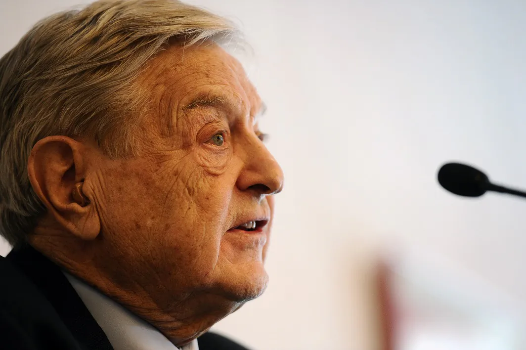 George Soros speaks to the media at the Swiss resort of Davos on Jan. 25, 2012. (VINCENZO PINTO/AFP via Getty Images)