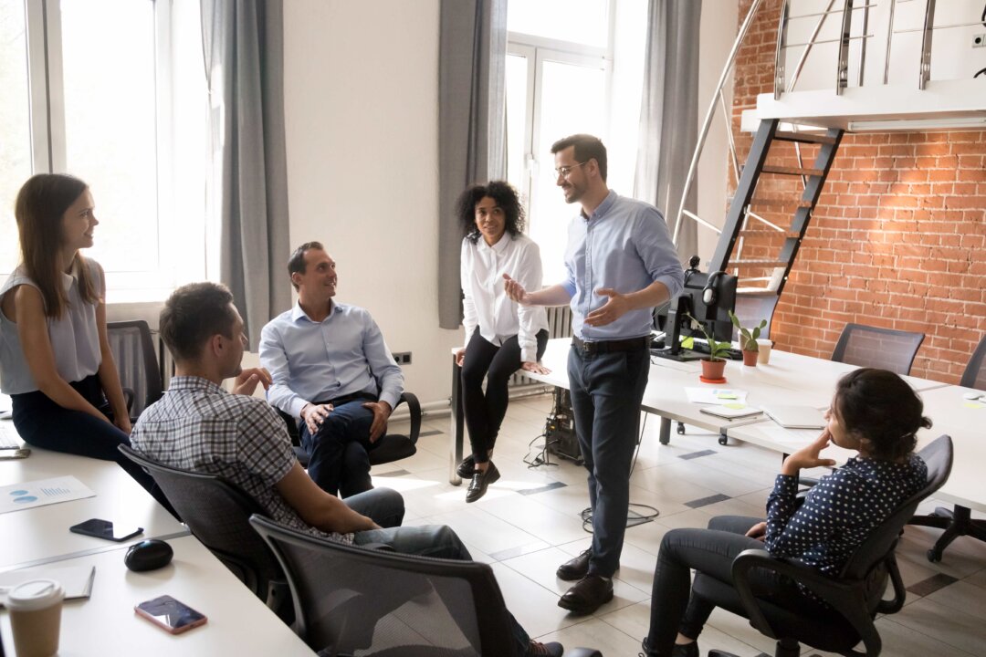 The boss that thumps his chest might be effective, but the lighter you can assert your authority, the better you can bring your team onside. (fizkes/Shutterstock)