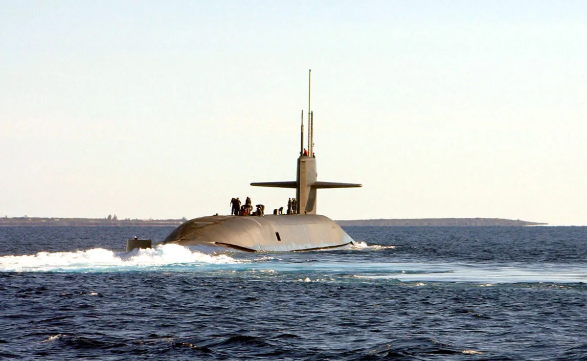 A nuclear propulsion Ohio class submarine, the USS Florida sails on Jan. 22, 2003 off the coast of the Bahamas. Australia as part of the AUKUS deal will get the tech for nuclear powered subs. (David Nagle/U.S. Navy/Getty Images)