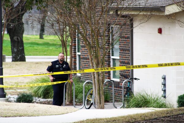 A law enforcement officer patrols the Pride Rock residence