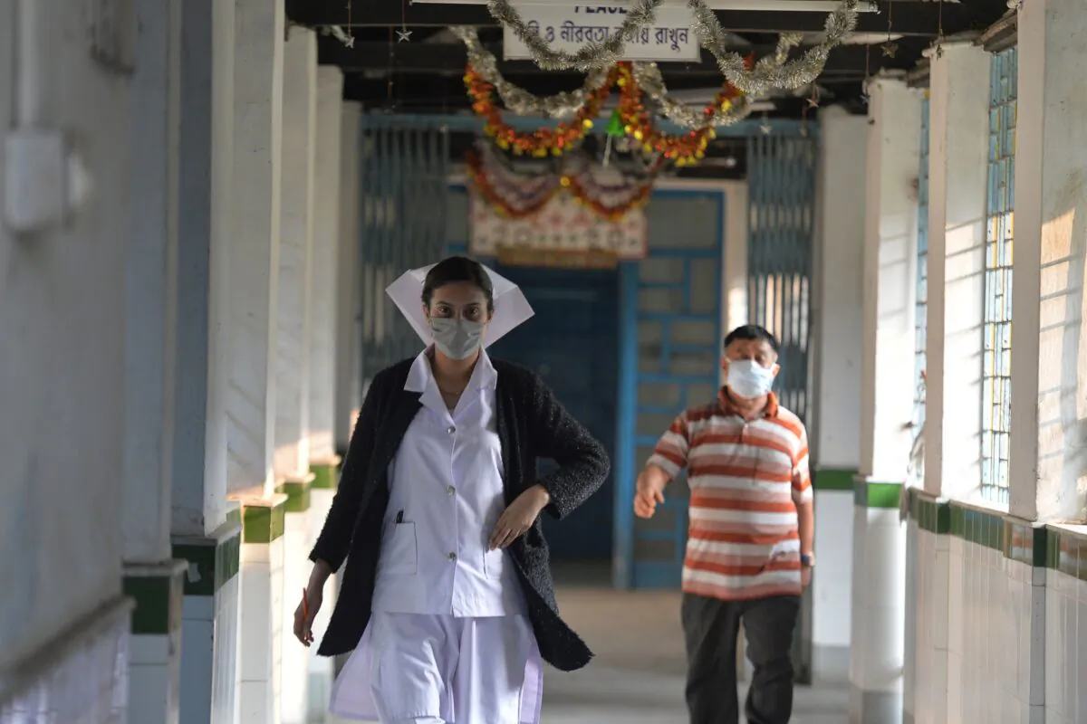 A nurse wearing a facemask walks inside an isolation ward opened as a preventative measure at the North Bengal Medical college and Hospital in Siliguri on Feb. 4, 2020. (ADiptendu Dutta/AFP via Getty Images)