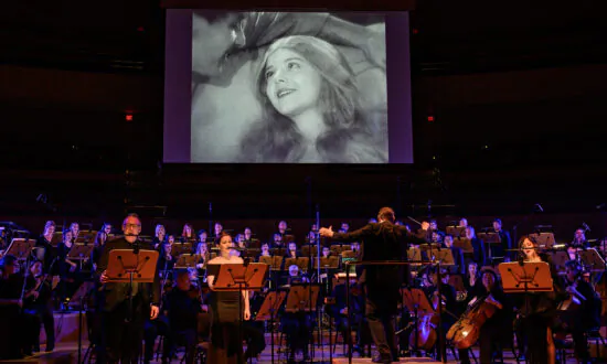 Settling an Old Score: A Song of Two Humans