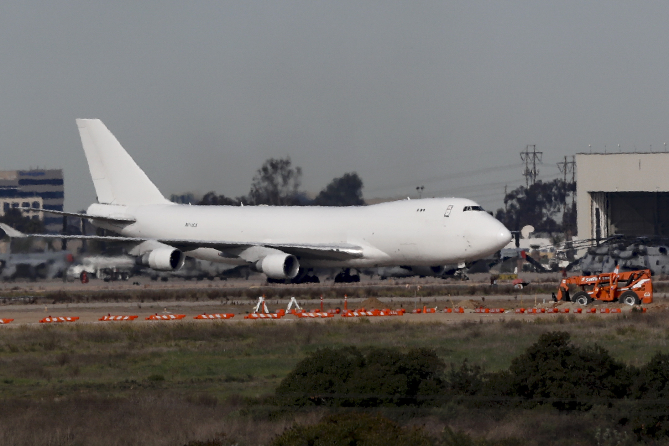 A plane carrying evacuees from the virus zone in China