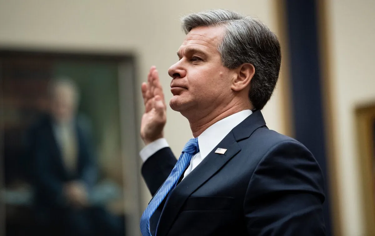 FBI Director Christopher Wray takes the oath before a full committee hearing on "Oversight of the Federal Bureau of Investigation" on Capitol Hill on Feb. 5, 2020. (Brendan Smialowski/AFP via Getty Images)