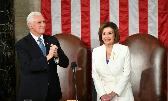 Vice President Mike Pence and Speaker of the House Nancy Pelosi are seen at their seats  before President Donald Trump's State of the Union address at the U.S. Capitol in Washington, on Feb. 4, 2020. (Mandel Ngan/AFP via Getty Images) 