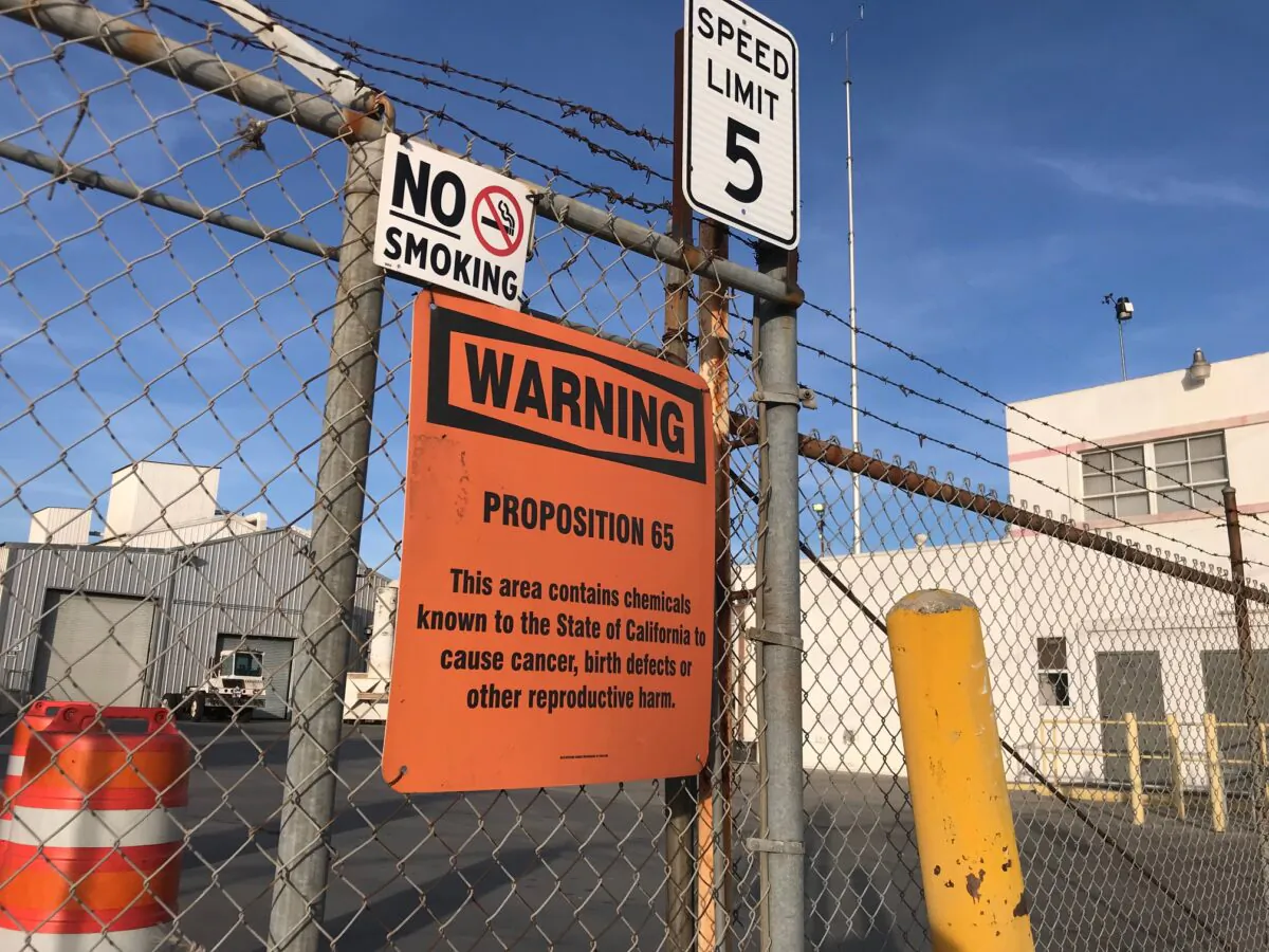 A sign outside a shuttered Exide Technologies battery recycling plant in Commerce, Calif., on Jan. 31, 2020. The plant was the source of lead and arsenic pollution covering neighborhoods in the surrounding 1.7 miles. (Chris Karr/The Epoch Times)