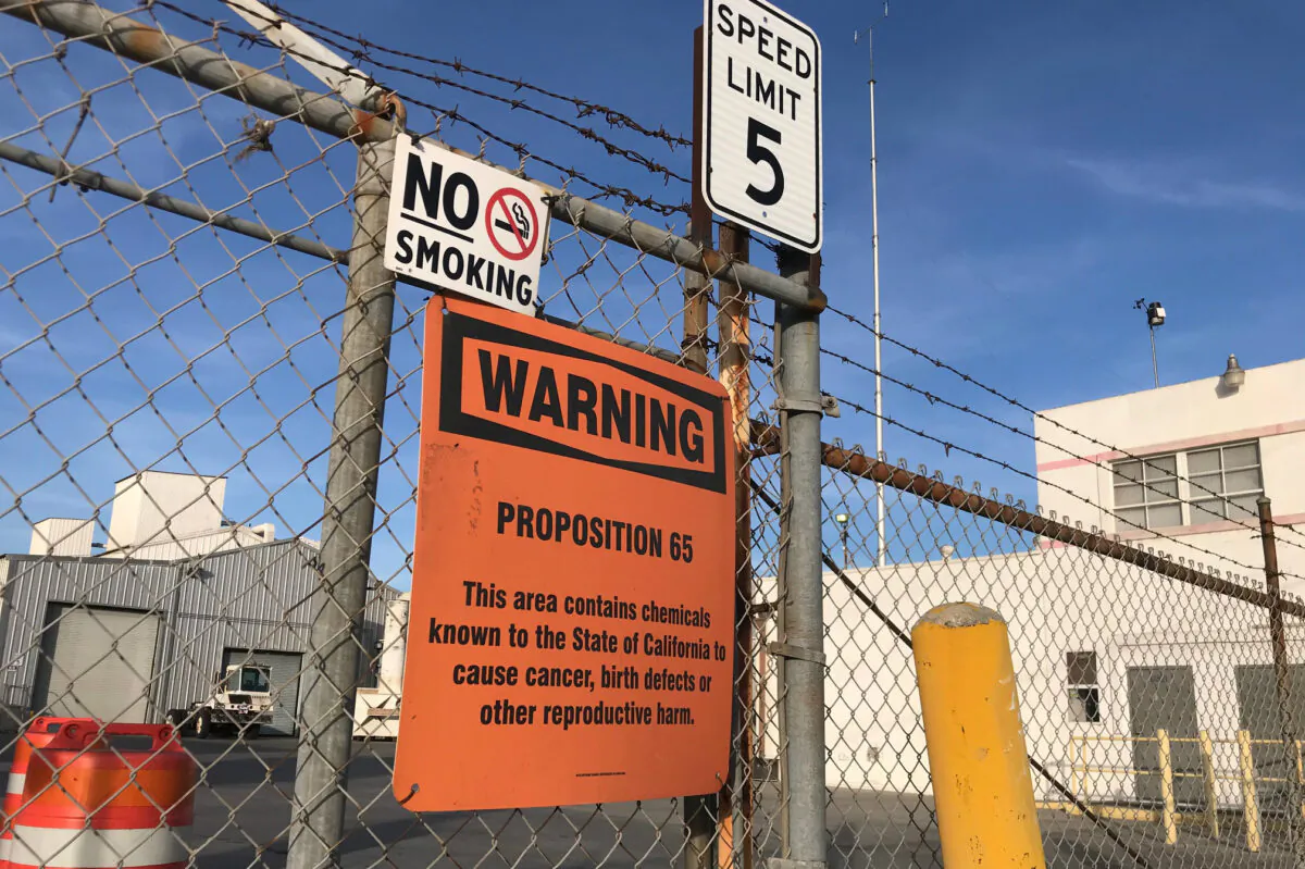 A sign outside a shuttered Exide Technologies battery recycling plant in Commerce, Calif., on Jan. 31, 2020. The plant was the source of lead and arsenic pollution covering neighborhoods in the surrounding 1.7 miles. (Chris Karr/The Epoch Times)
