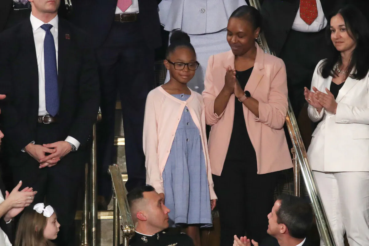 Stephanie Davis and her daughter Janiyah, attend the State of the Union address in the chamber of the U.S. House of Representatives, on February 04, 2020. (Drew Angerer/Getty Images)