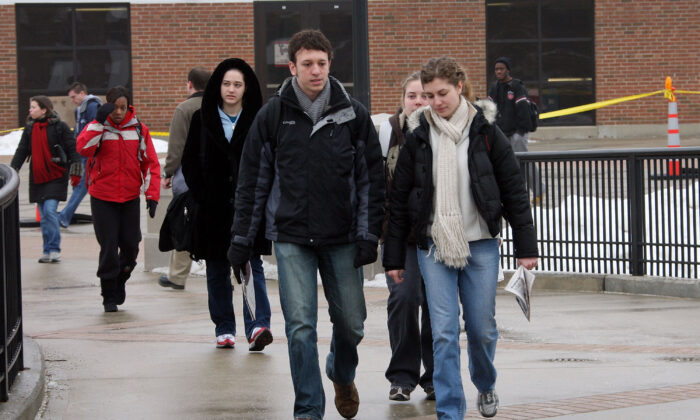 Students pass by Cole Hall as they walk to class at Northern Illinois University in DeKalb, Ill., on Feb. 25, 2008. (Scott Olson/Getty Images)