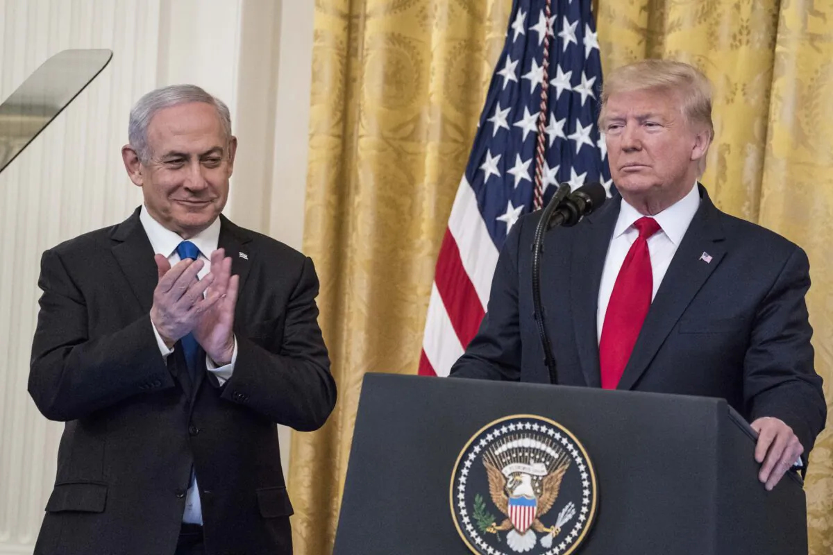 President Donald Trump and Israeli Prime Minister Benjamin Netanyahu participate in a joint statement in the East Room of the White House on Jan. 28, 2020. (Sarah Silbiger/Getty Images)
