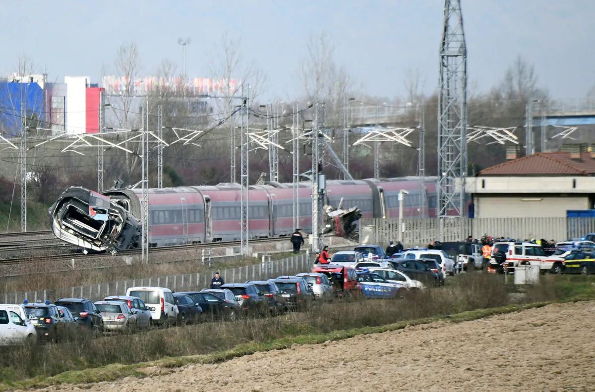 Emergency personnel work after a high speed train travelling from Milan to Bologna derailed killing at least two people near Lodi, Italy on Feb. 6, 2020. (Flavio Lo Scalzo/Reuters)
