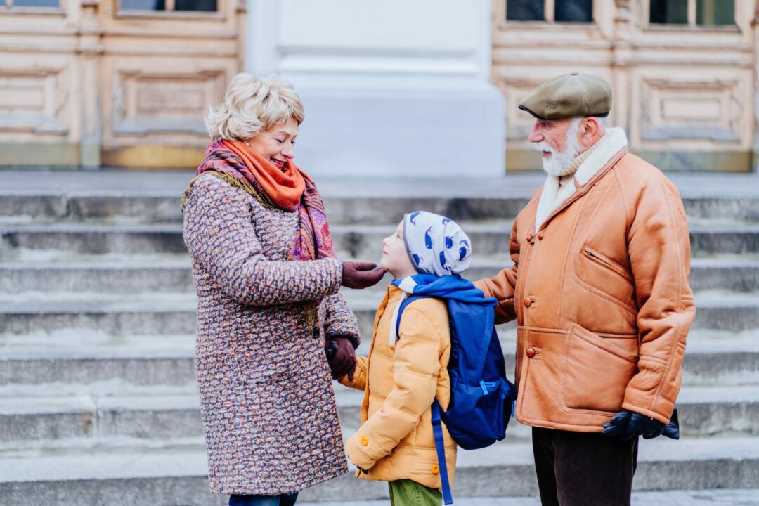 Walking your grandchild to and from school is a great way to get some gentle exercise. (Iryna Inshyna/Shutterstock)