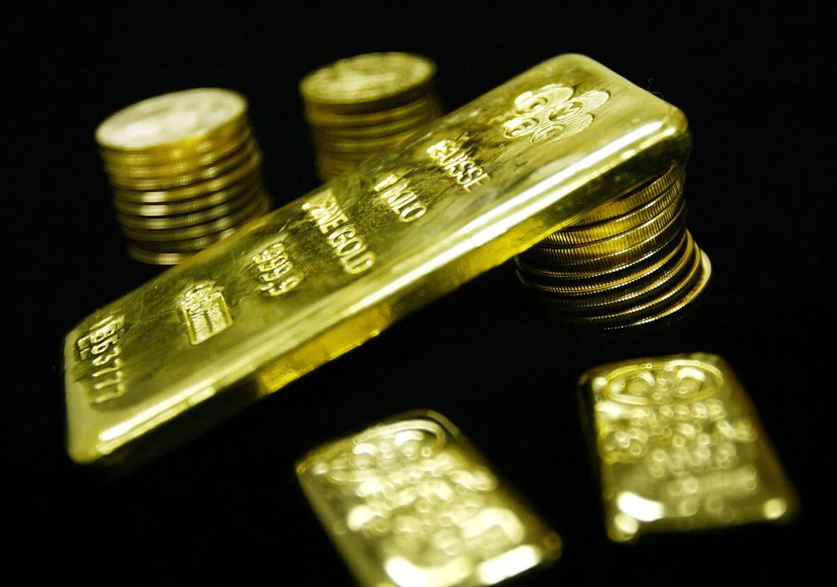 Gold bullion bars and coins are seen for sale, in this file photo. (Mario Tama/Getty Images)