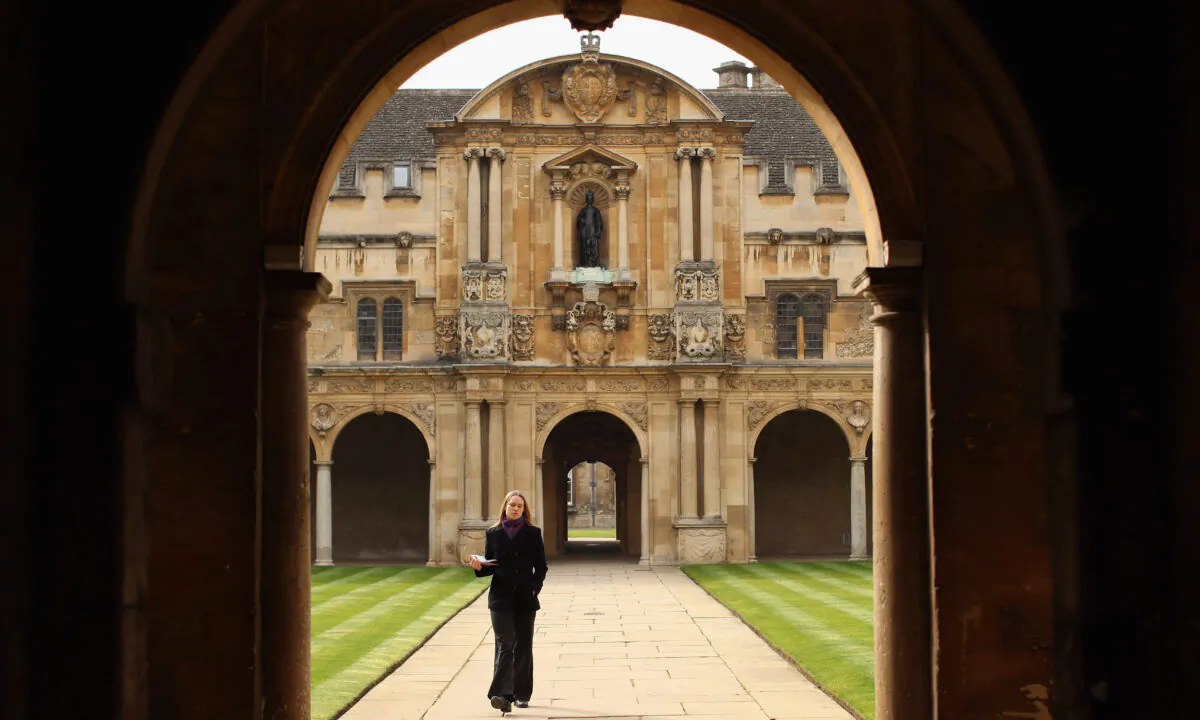 A woman walks through Canterbury Quadrangle in St John's College in Oxford, England, on March 22, 2012.  (Oli Scarff/Getty Images)