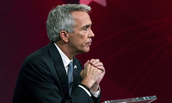 In this Sept. 24, 2019, file photo, Republican presidential candidate and former Rep. Joe Walsh (R-Ill.) listens to a question during a debate in New York. Walsh said Feb. 7, 2020, he is suspending his campaign. (Julius Constantine Motal/AP Photo)