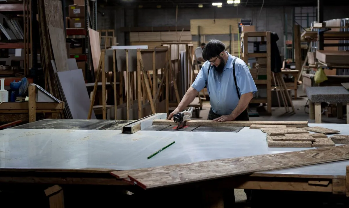 A worker at Riverside RV in LaGrange, Ind., on Jan. 24, 2020. (Brendan Smialowski/AFP via Getty Images)