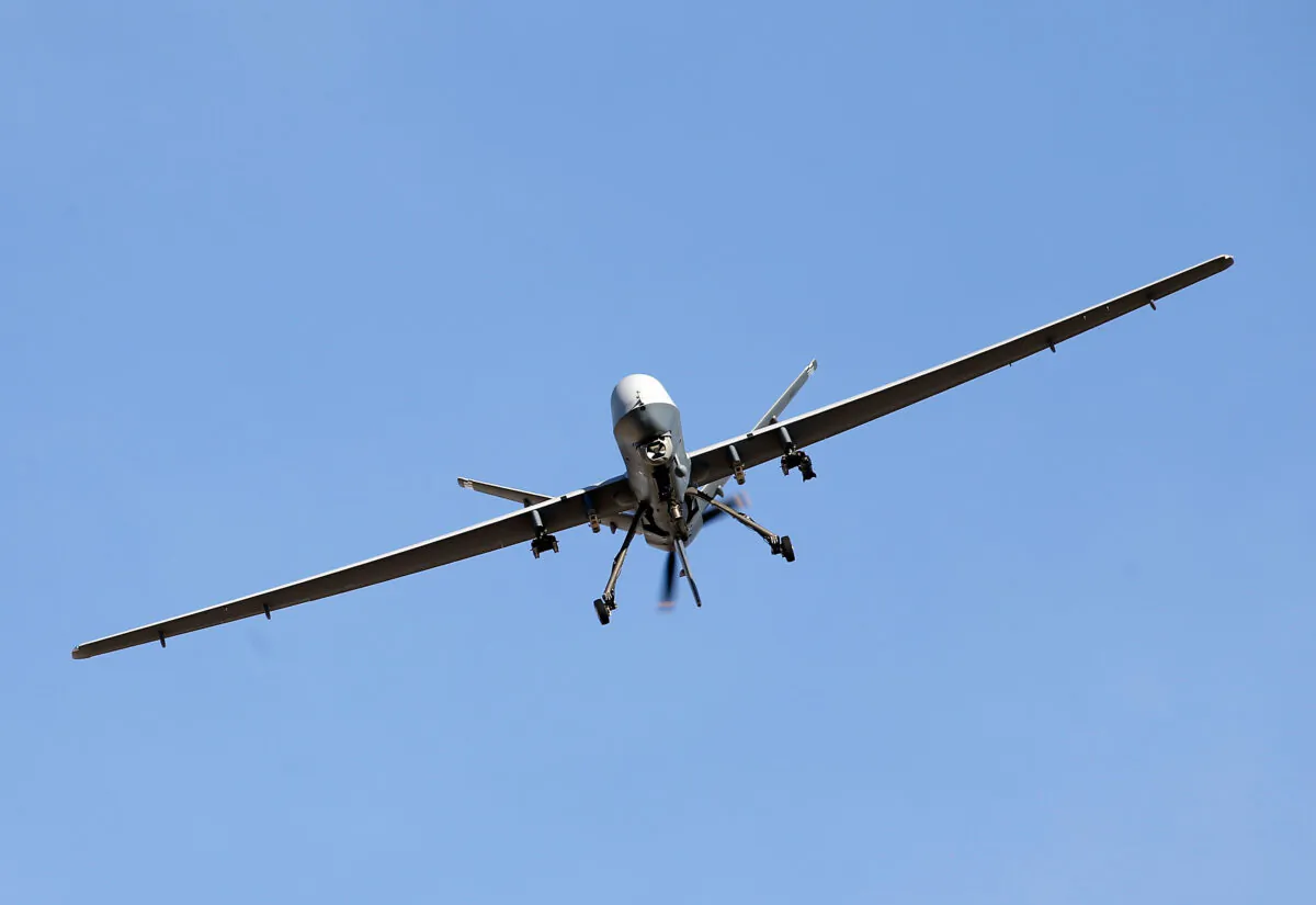An MQ-9 Reaper remotely piloted aircraft flies in a training mission in Nevada in a file photograph. (Isaac Brekken/Getty Images)