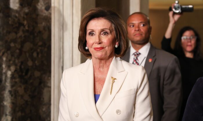 Speaker of the House Rep. Nancy Pelosi (D-Calif.) walks through Statuary Hall to the House Chamber for President Donald Trump's State of the Union address in the Capitol in Washington on Feb. 4, 2020. (Charlotte Cuthbertson/The Epoch Times)