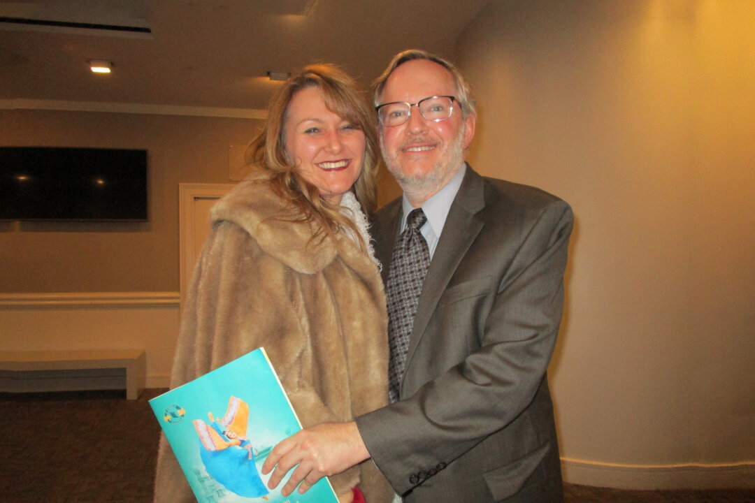 Chris Sanders (R), a criminal defense attorney, and his companion attended Shen Yun Performing Arts at the Belk Theater at Blumenthal Performing Arts Center in Charlotte, North Carolina, on Feb. 8, 2020. (Sherry Dong/The Epoch Times)
