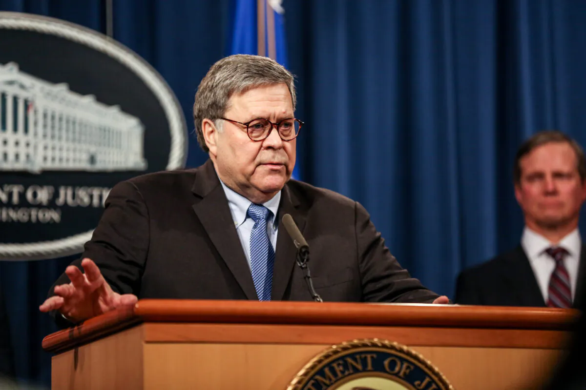 Attorney General Bill Barr and justice officials hold a press conference at the Justice Department in Washington on Jan. 13, 2020. (Charlotte Cuthbertson/The Epoch Times)