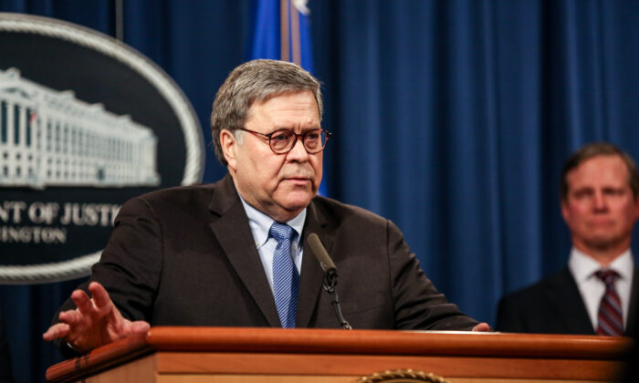 Attorney General Bill Barr and justice officials hold a press conference at the Justice Department in Washington on Jan. 13, 2020. (Charlotte Cuthbertson/The Epoch Times)