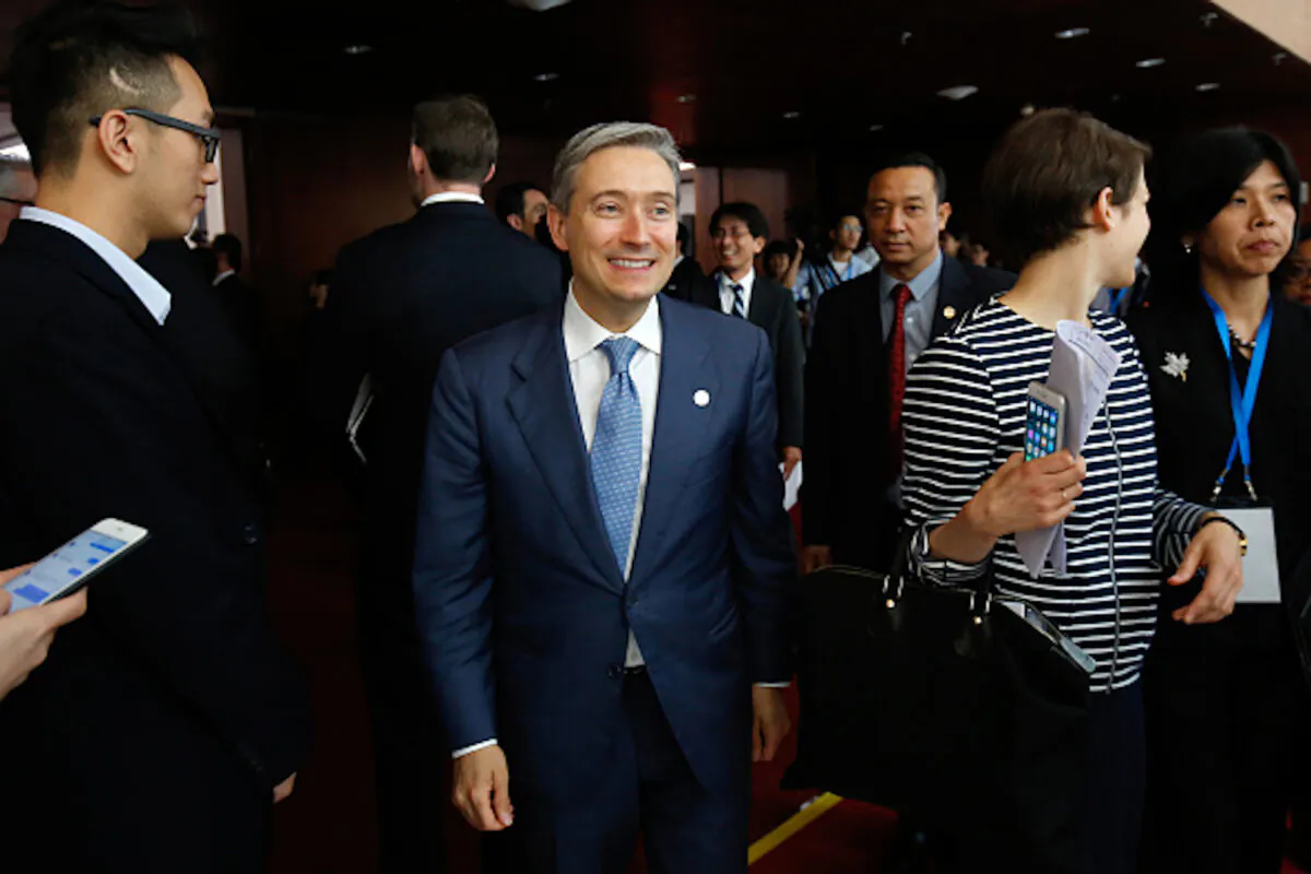 Canada's International Trade Minister Francois-Philippe Champagne (C) leaves a press conference during the Asia-Pacific Economic Cooperation (APEC) 23rd Ministers responsible for Trade Meeting in Hanoi, Vietnam, on May 21, 2017. (Kham/AFP via Getty Images)