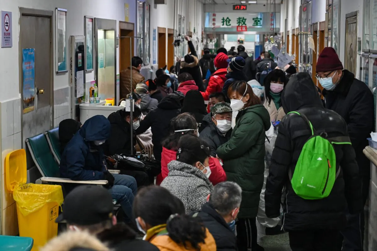 People are waiting for medical attention at Wuhan Red Cross Hospital in Wuhan, China on Jan. 25, 2020. (Hector Retamal/AFP via Getty Images)