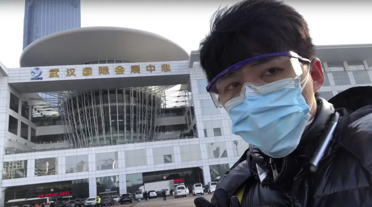 Chinese citizen journalist Chen Qiushi speaks in front of a convention center-turned makeshift hospital amid a viral outbreak in Wuhan in central China's Hubei Province, on Feb. 4, 2020. Armed with smartphones and social media accounts, Chen and other citizen journalists in China are telling stories from the deadly outbreak in their own words, defying the ruling Communist Party's monopoly on information. Chen disappeared last week after garnering millions of views online. (Courtesy of Chen Qiushi via AP)