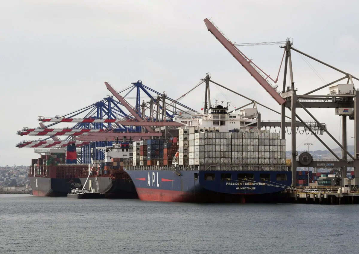 Shipping containers are unloaded at the Port of Los Angeles in Long Beach, California on May 14, 2019. (Mark Ralston/AFP via Getty Images)