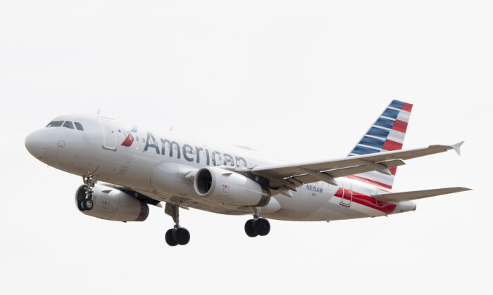 An Airbus 319 operated by American Airlines approaches for landing at Baltimore Washington International Airport near Baltimore, Md., on March 11, 2019. (Jim Watson/AFP via Getty Images)