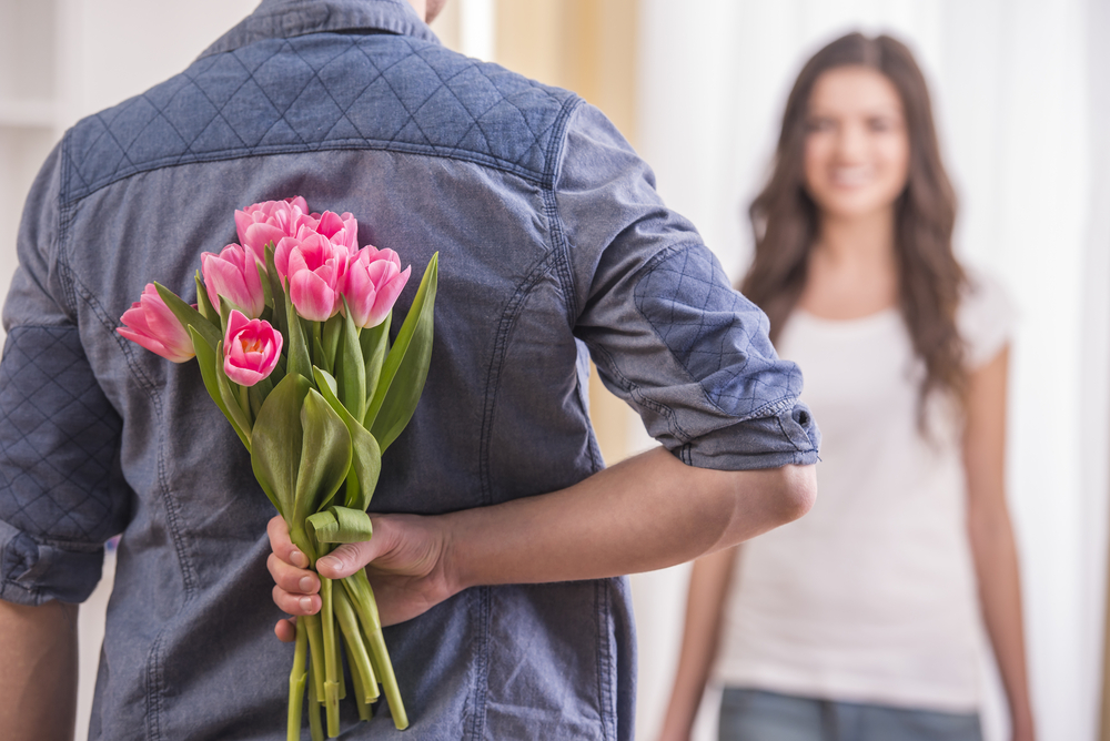 When you arrive home February 13, tell the lady in your life you picked up the flowers a day early, and ask for a vase. Remember: Early, early, early. (Shutterstock)