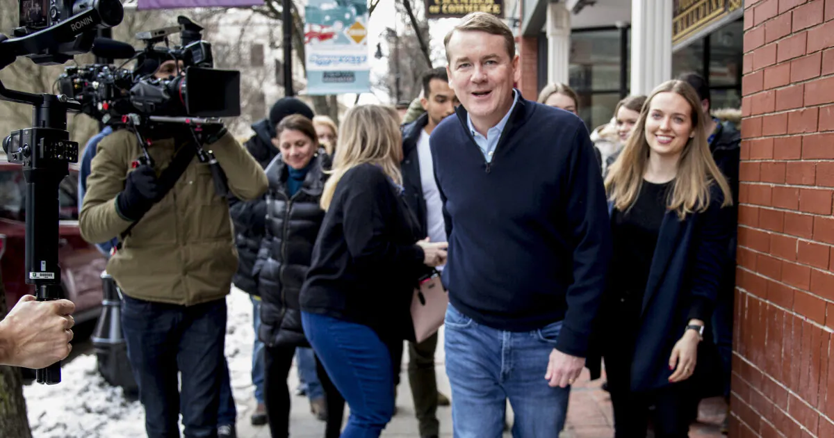 Democratic presidential candidate Sen. Michael Bennet (D-Colo.) arrives for a campaign stop at the Spotlight Room at the Palace on Feb. 8, 2020, in Manchester, N.H. (Andrew Harnik/AP)