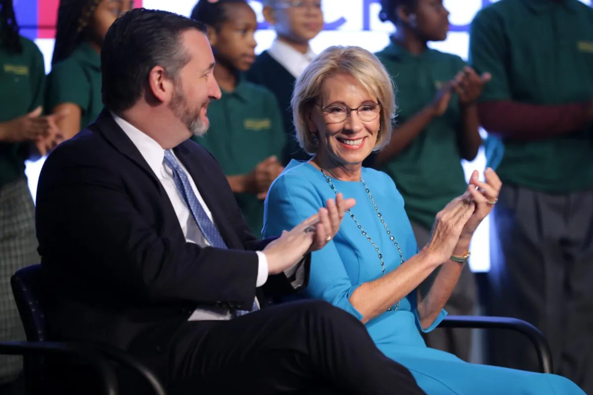 Education Secretary Betsy DeVos (R) and Sen. Ted Cruz (R-Texas) participate in an event about their proposal for Education Freedom Scholarships at the Education Department headquarters in Washington on Feb. 28, 2019. According to the department, the scholarships will be funded with $5 billion of federal tax credit for donations to scholarships for private schools and other educational programs and would "significantly expand education freedom for millions of students and families across the country." (Chip Somodevilla/Getty Images)
