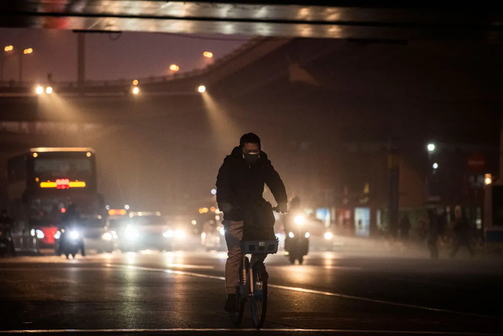A Chinese man wears a protective mask in Beijing on Feb. 13, 2020. (Kevin Frayer/Getty Images)