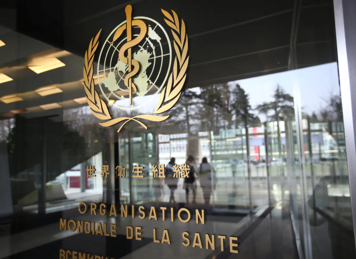 A logo is pictured outside a building of the  World Health Organization (WHO) during an executive board meeting on update on the CCP virus outbreak, in Geneva, Switzerland, on Feb. 6, 2020. (Denis Balibouse/Reuters)