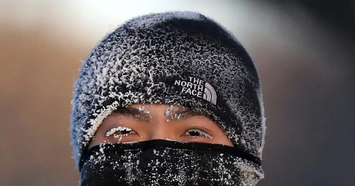 A runner wears the cold on his face while running along West River Parkway hills on Feb. 13, 2020, near downtown Minneapolis, with temperatures hovering near minus 30 degrees Fahrenheit with wind chills. (David Joles/Star Tribune via AP)