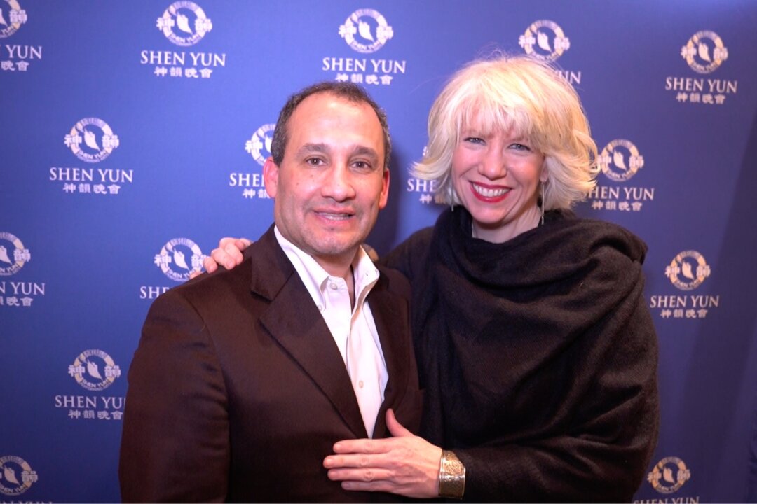 Thomas Earle, attorney and CEO, brought his companion Kim Desrosiers, environmental engineer, to Shen Yun Performing Arts at Philadelphia's Merriam Theater, Feb. 14, 2020. (NTD Television)
