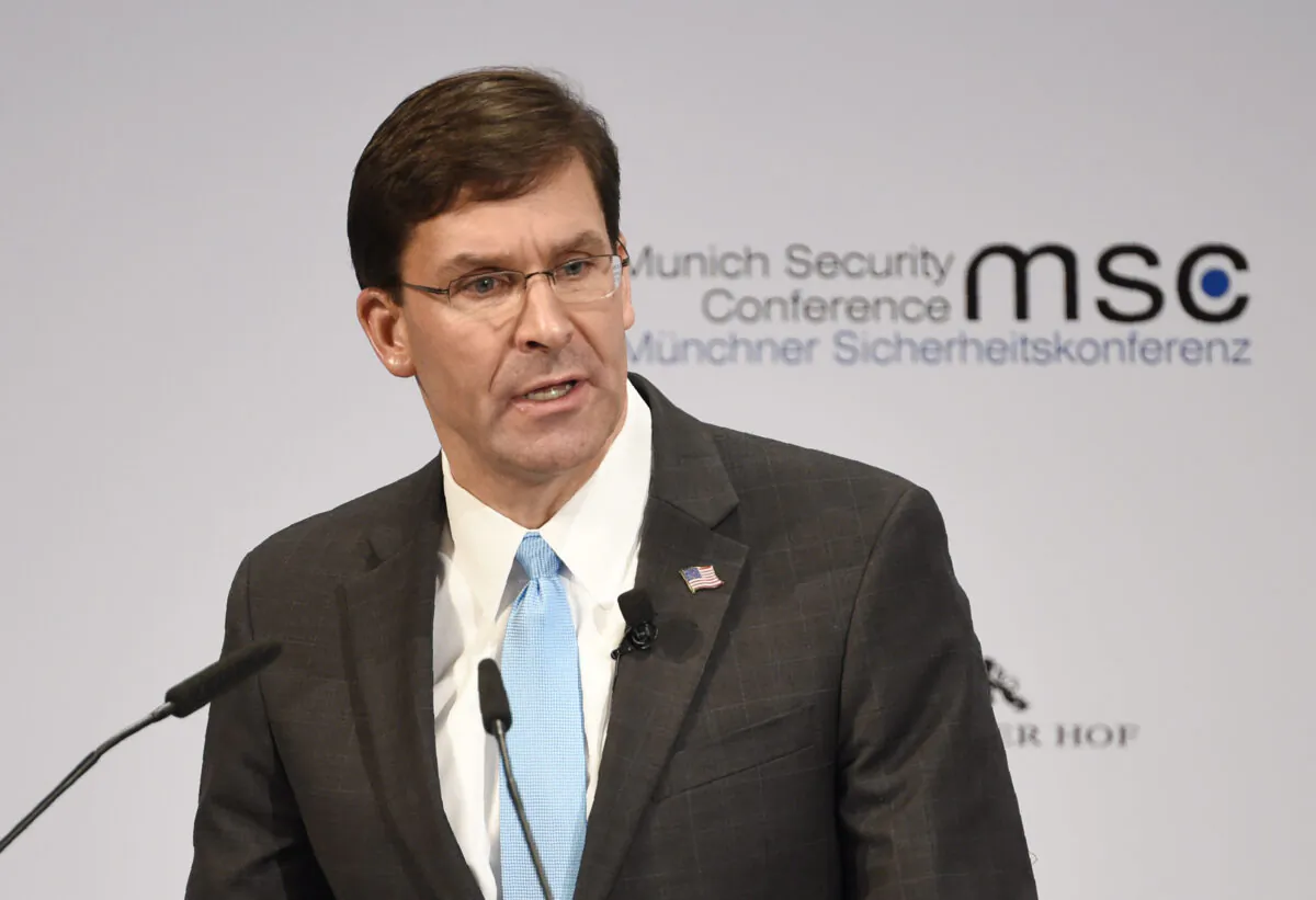 U.S. Secretary of Defence Mark Esper speaks on the second day of the Munich Security Conference in Munich, Germany, on Feb. 15, 2020. (AP Photo/Jens Meyer)