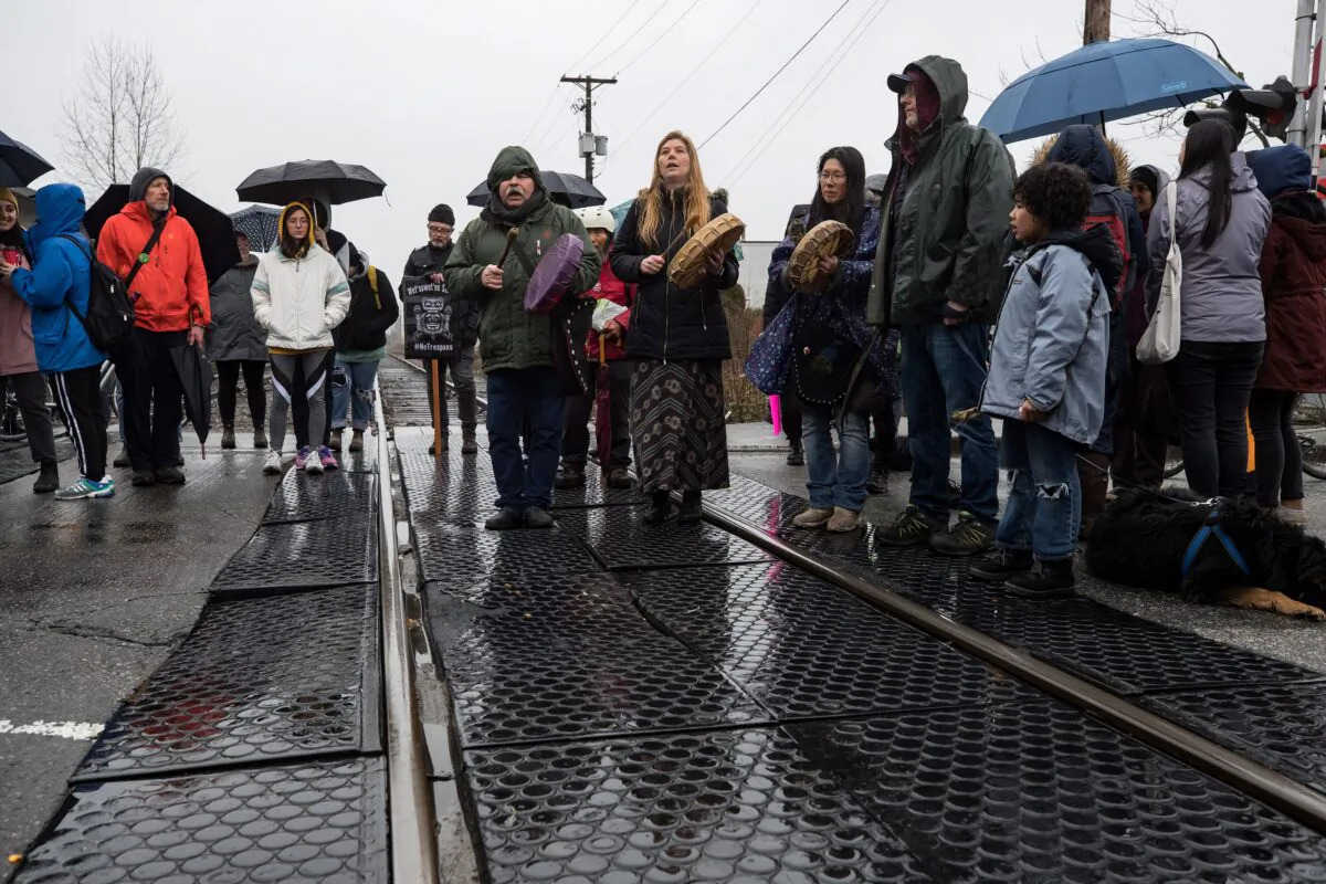 Protesters blockade CN Rail tracks in Vancouver on Feb. 15, 2020. (The Canadian Press/Darryl Dyck)