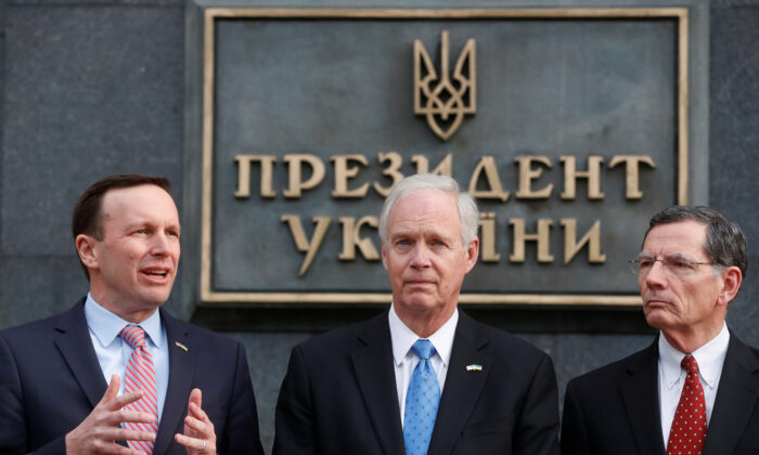 U.S. Senators Ron Johnson, John Barrasso, and Chris Murphy attend a news briefing following their meeting with Ukrainian President Volodymyr Zelenskiy in Kiev on Feb. 14, 2020. (Valentyn Ogirenko/Reuters)