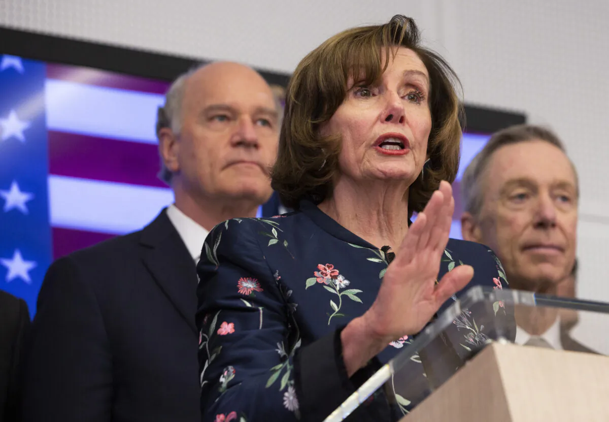 Speaker of the House Nancy Pelosi, D-Calif, center, speaks during a media conference after a meeting at NATO headquarters in Brussels, on Feb. 17, 2020. Speaker of the House Nancy Pelosi is on a one day visit to Brussels to meet with leaders of the EU and NATO. (Virginia Mayo/AP)